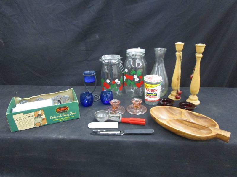 lot 89 image: Old cookie press, deco, ruby red, pink depression rough edges, strawberry dcor canister