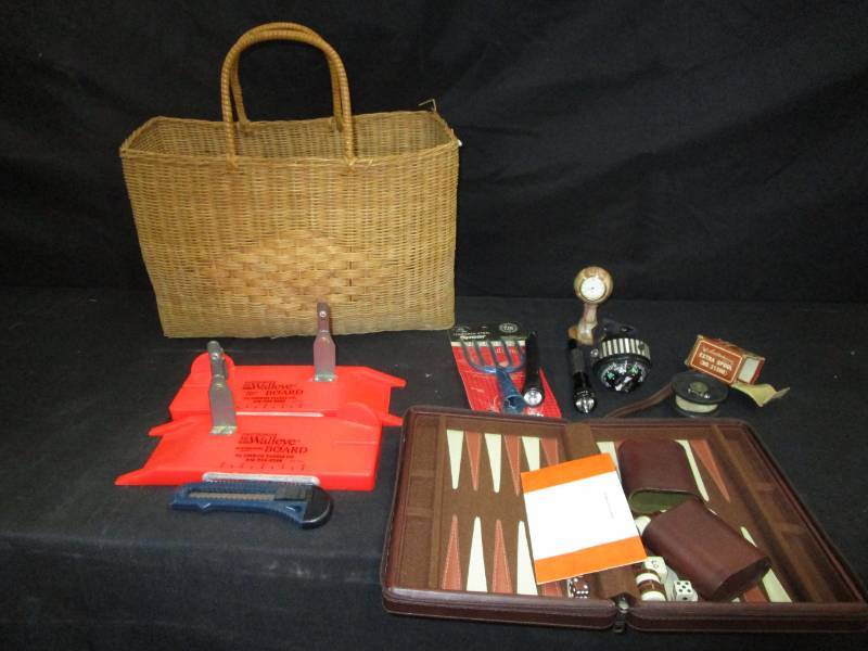 lot 98 image: Two Mr. Walleye Boards, Flashlights, Compass, Spear, Basket, Travel Backgammon.