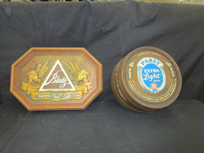 lot 118 image: Blatz and Pabst Plastic Beer Dcor damage on , see pictures