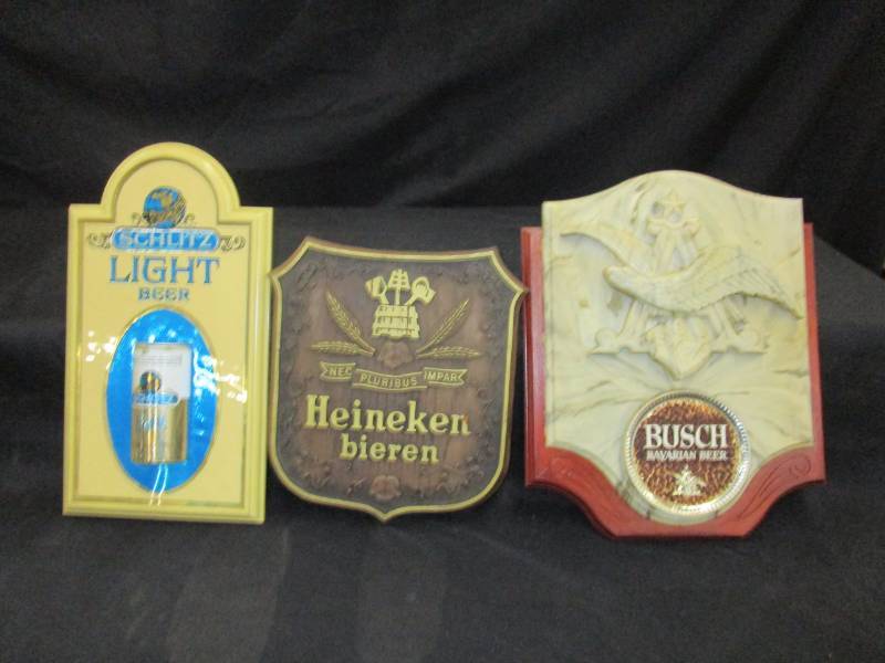 lot 121 image: Plastic Schlitz, Heineken and Busch Signs(damaged)