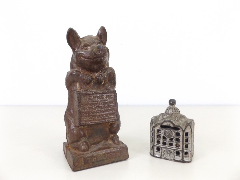 lot 20 image: 2 Antique Cast Iron Banks filled with Wheat Pennies