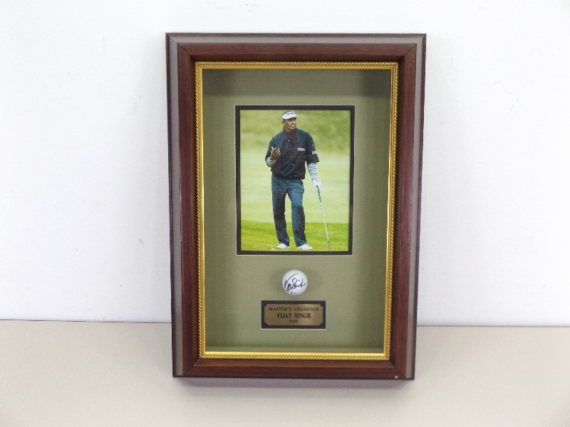 lot 47 image: Autographed 2000 Masters Champ Vijay Singh Framed Golf Ball