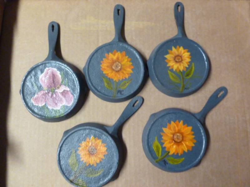 lot 166 image: Cast Iron Pan Decorations
