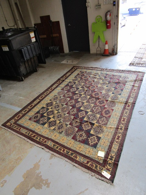 lot 115 image: HAND-WOVEN RUG