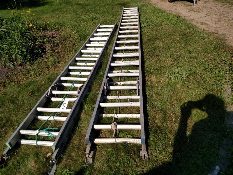 lot 27 image: 36 Aluminum Extension Ladder...
