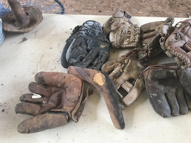 lot 40 image: 10 VINTAGE BASEBALL GLOVES  WOODEN BOOMERANG