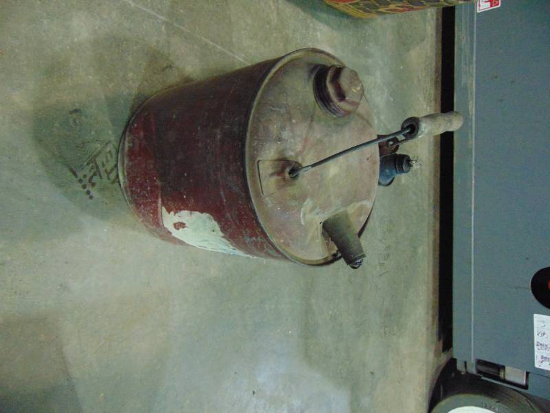 lot 53 image: Vintage Gas Can and Oil Light