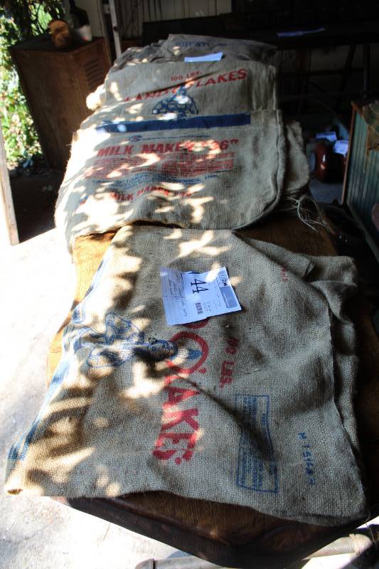 lot 44 image: Lot of (5) Land-O-Lakes Gunny Sacks