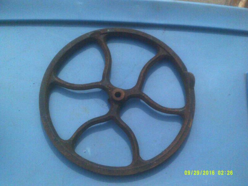 ANTIQUE CAST IRON STEERING WHEEL