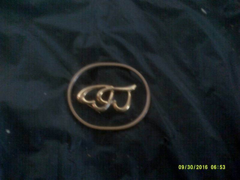 GOLD BRACELET AND PIN