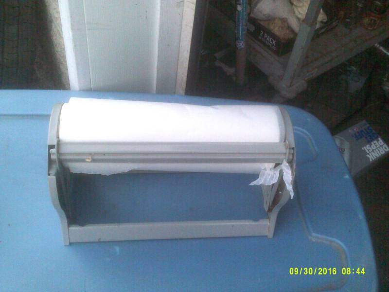 PAPER HOLDER AND CUTTER