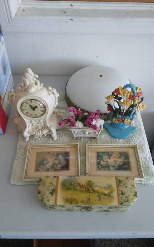 lot 8 image: Cast Iron Door Stop, Old Clock, Rug, Ceiling Light Fixture, Misc.