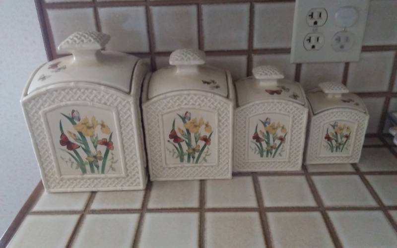 lot 15 image: Set Of 4 Enesco Canisters, Butter Fly Trellis
