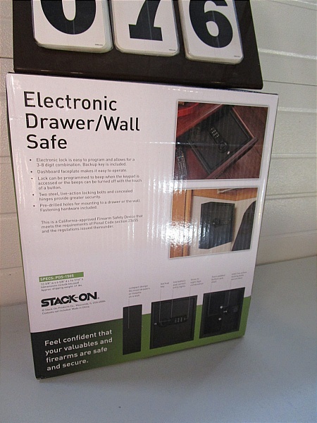 lot 76 image: Stack-On DrawerWall Safe