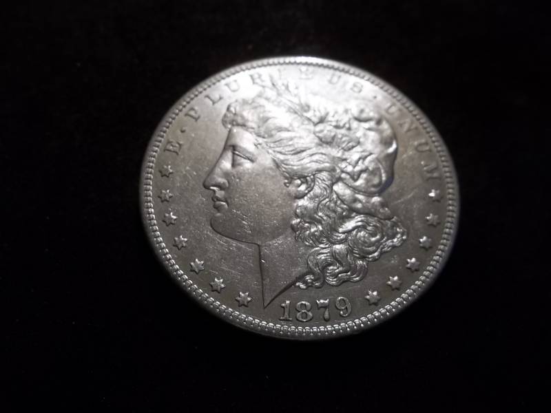 lot 2 image: 1879 S  Morgan Silver Dollar