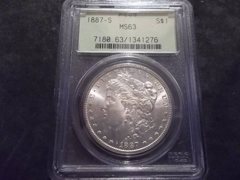 lot 7 image: 1887 S Morgan Silver Dollar