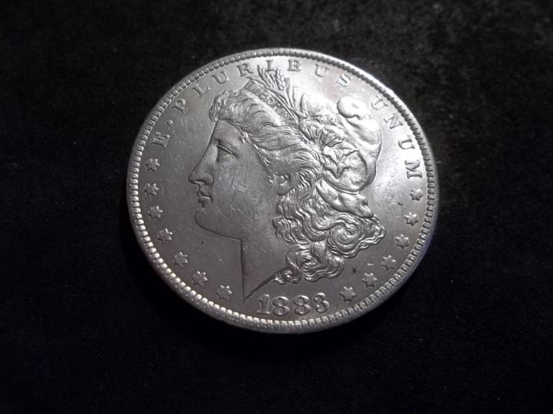 lot 8 image: 1883 O Morgan Silver Dollar
