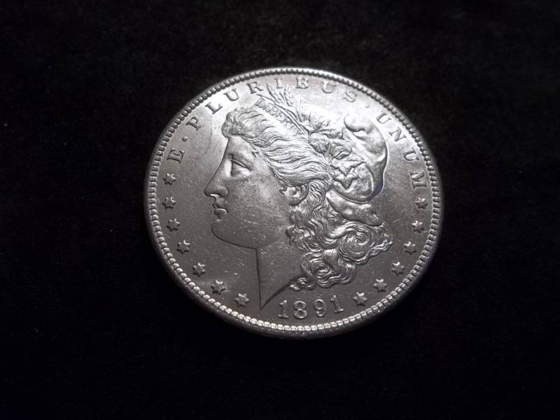 lot 10 image: 1891 S Morgan Silver Dollar