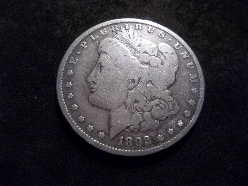 lot 11 image: 1892 O Morgan Silver Dollar