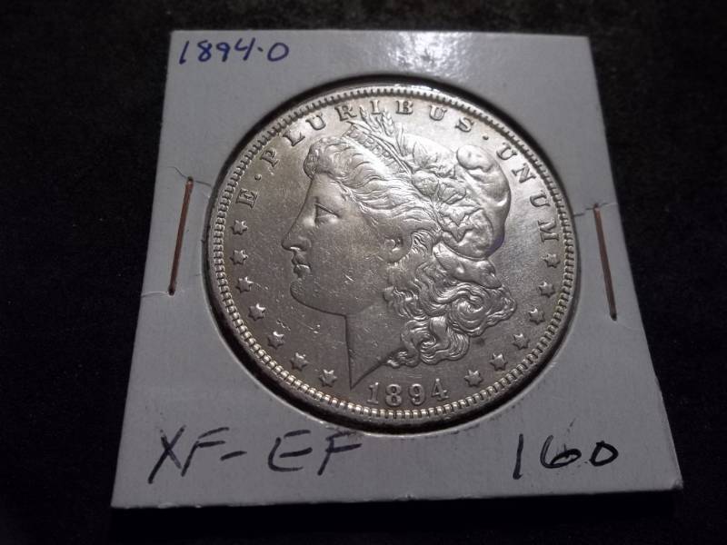 lot 13 image: 1894 O Morgan Silver Dollar