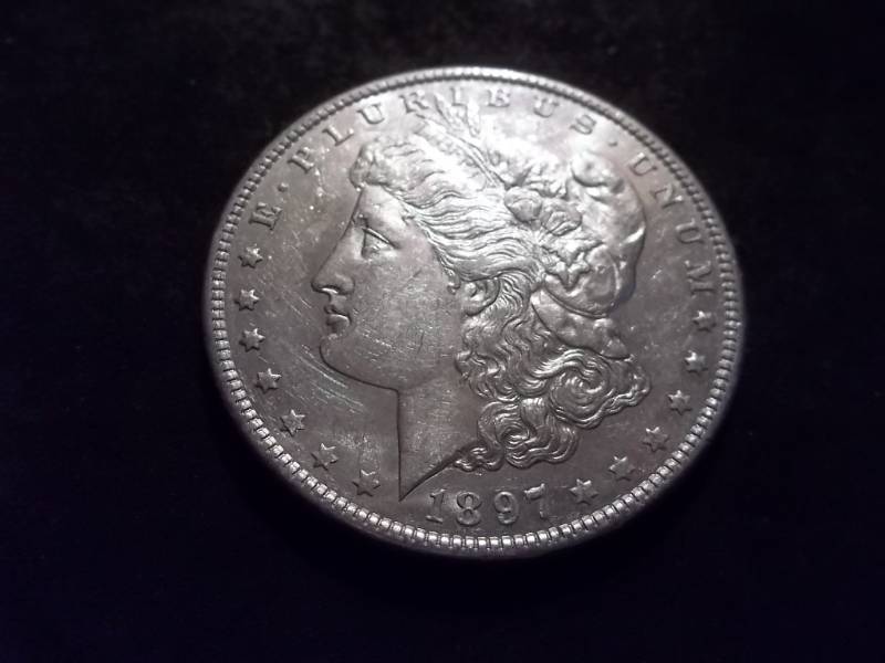 lot 16 image: 1897 S Morgan Silver Dollar