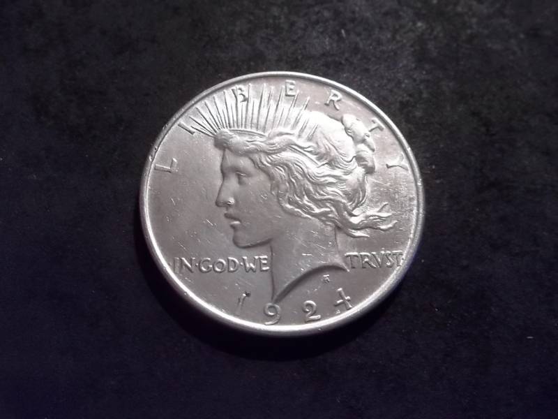 lot 26 image: 1924 Peace Silver Dollar