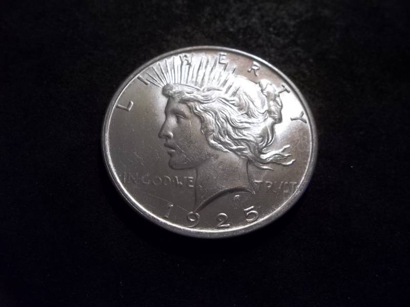 lot 27 image: 1925 Peace Silver Dollar