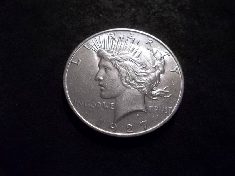 lot 28 image: 1927 D Peace Silver Dollar