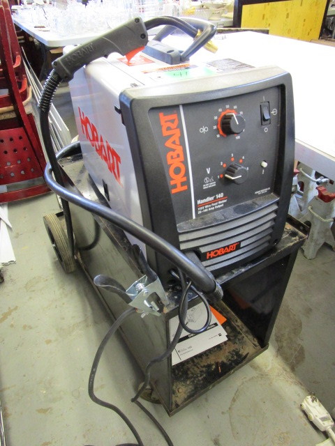 lot 414 image: HOBART BROTHERS WIRE FEED WELDER W ROLLING RACK AND PROPANE TANK