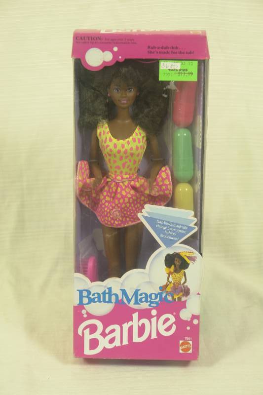 lot 20 image: Four Barbies
