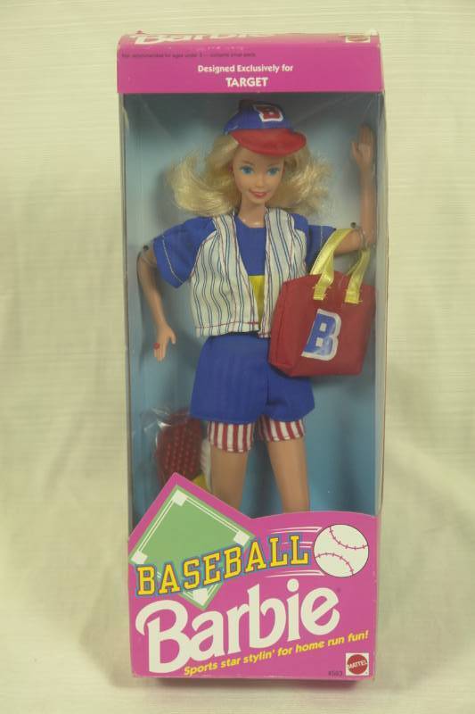 lot 21 image: Four Barbies