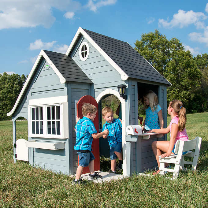 lot 2 image: Backyard Discovery Spring Cottage Cedar Playhouse, Retail $599.99