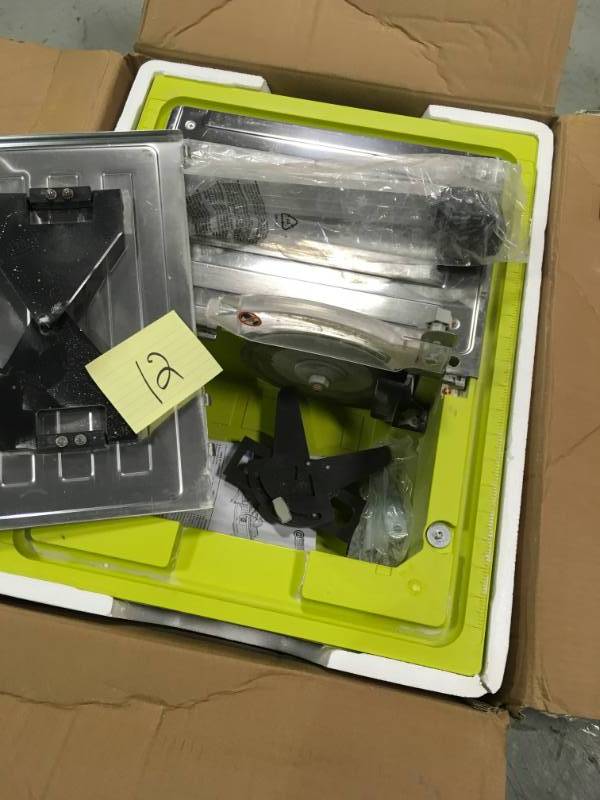 lot 12 image: Ryobi 7 in. 4.8 Amp Tabletop Tile Saw used In good working condition
