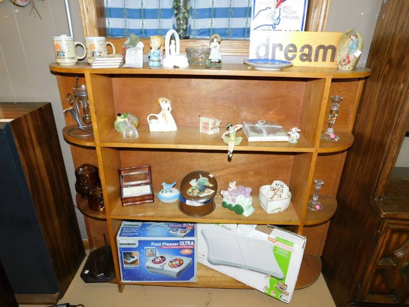 lot 11 image: Four Tiered Shelf Unit With Many Collectible Items On It