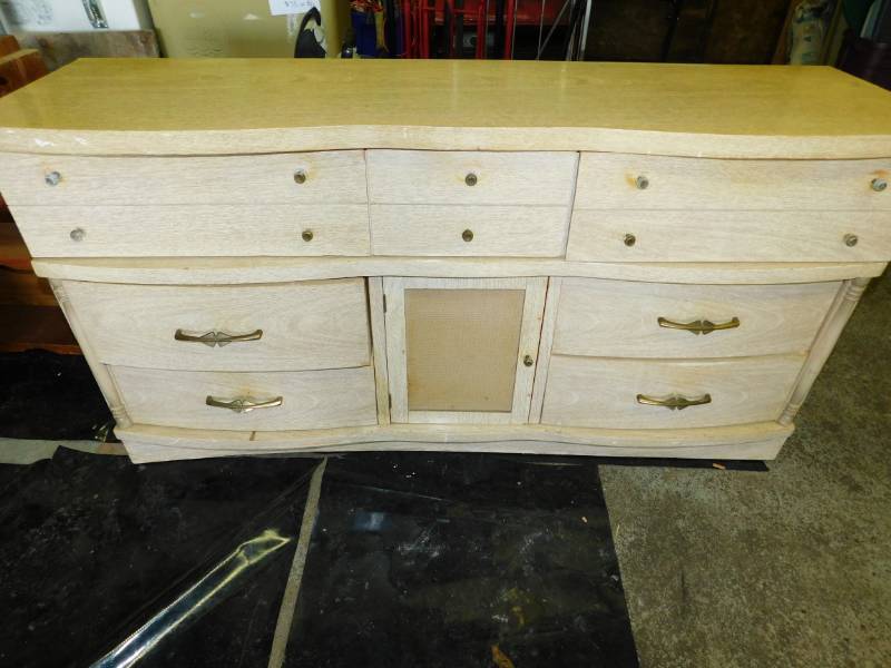 lot 48 image: Seven Drawers And One Door Blond Dresser---M-584140
