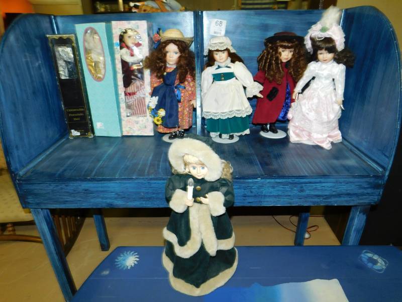 lot 71 image: Nine Dolls