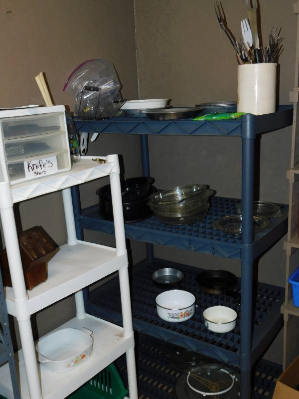 lot 93 image: Two Shelf Units & Contents On Them---Knives, Pans, Cooking  Utensils