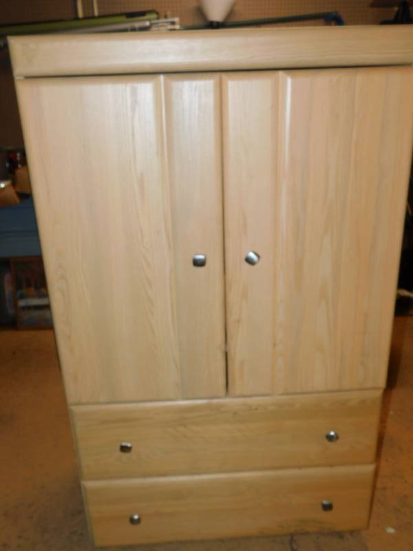 lot 105 image: TV StandTwo Doors & Two Drawers---Blond Finish---57 Tall  x  21 Deep  x  33 Wide