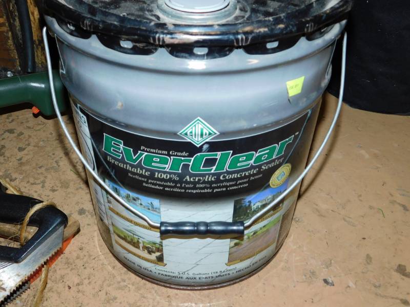 lot 106 image: Black  Material 56 Wide..Three Hand Saws----5 Gallon Pail Of Everclear22 Electric  Black & Decker Trimmer