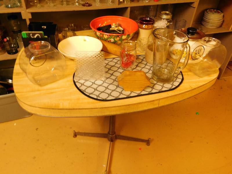 lot 100 image: Table With Contents On It