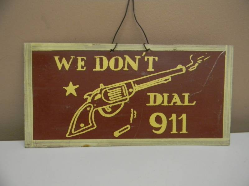 lot 49 image: VINTAGE TIN SIGN - WE DONT DIAL 911 - SEE PICTURES