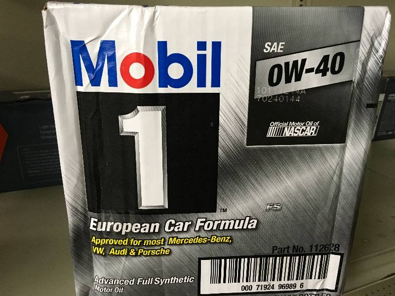 lot 52 image: Mobil 1 0W-40 Synthetic Oil, Retail $36.79