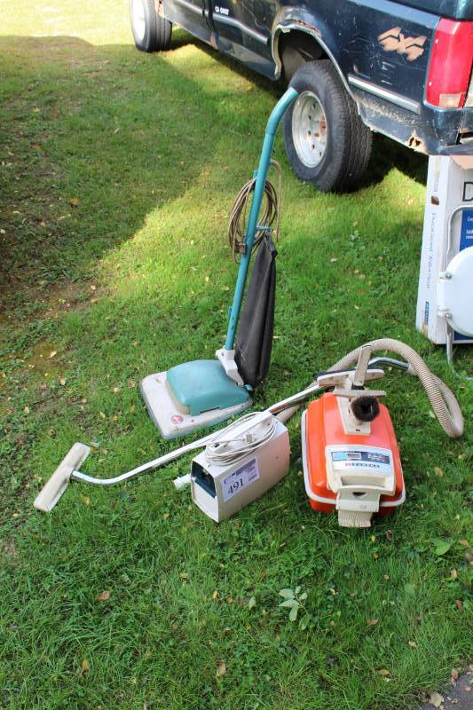 Lot of (3) Vintage Portable Vacuums - Hoover Upright Bagger, Hoover Portapower Box, Eureka Rolling Canister