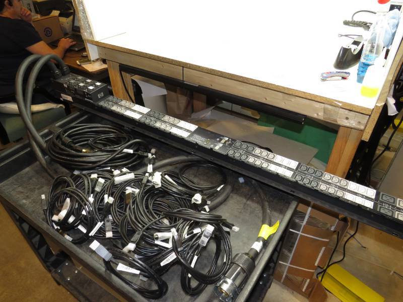 Power Monitoring PDU S2140 with assortment of cables.