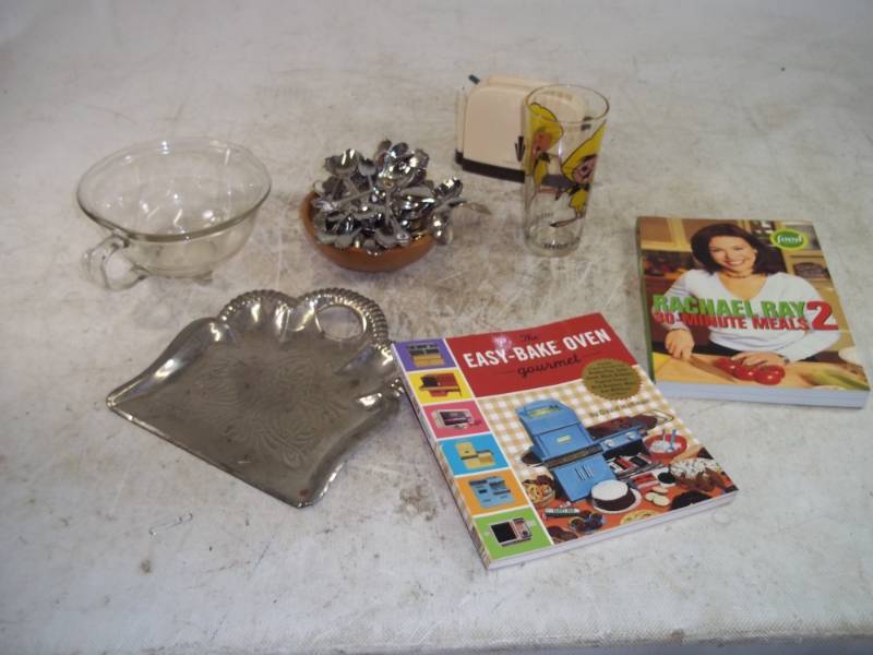 lot 76 image: Hazel Atlas Bowl, Recipe Books, Pepsi Glass, Toaster pad and pen, Spoons