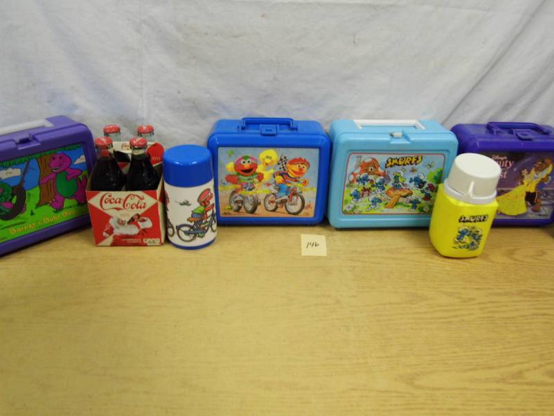 lot 146 image: Kids Lunch Boxes - Coke Bottles