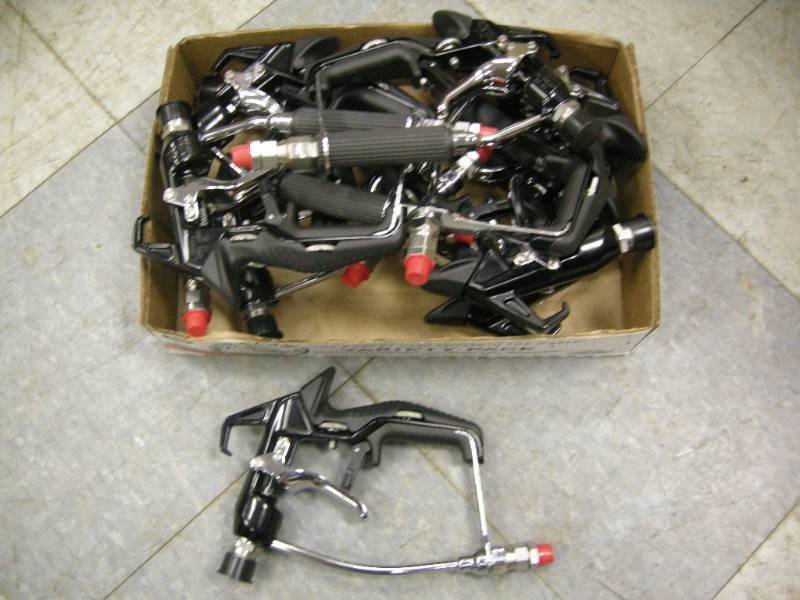 lot 152 image: 12 Like New Airless Sprayguns