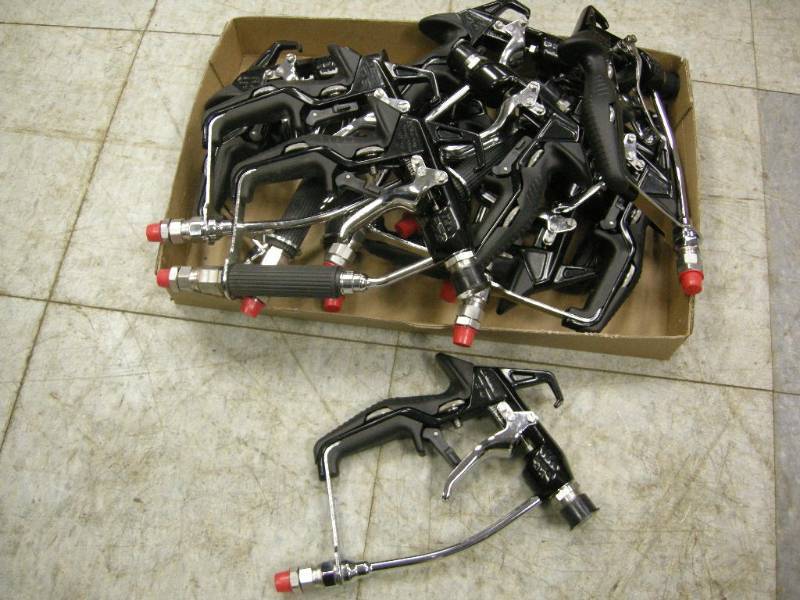 lot 163 image: 12 Like New Airless Sprayguns