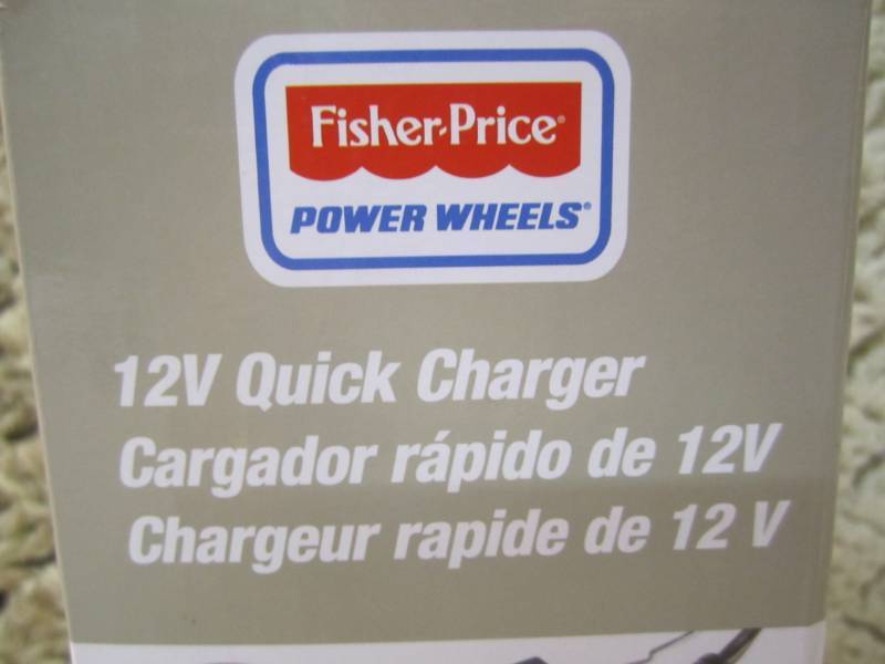 lot 106 image: Fisher Price Power Wheels 12V Quick...