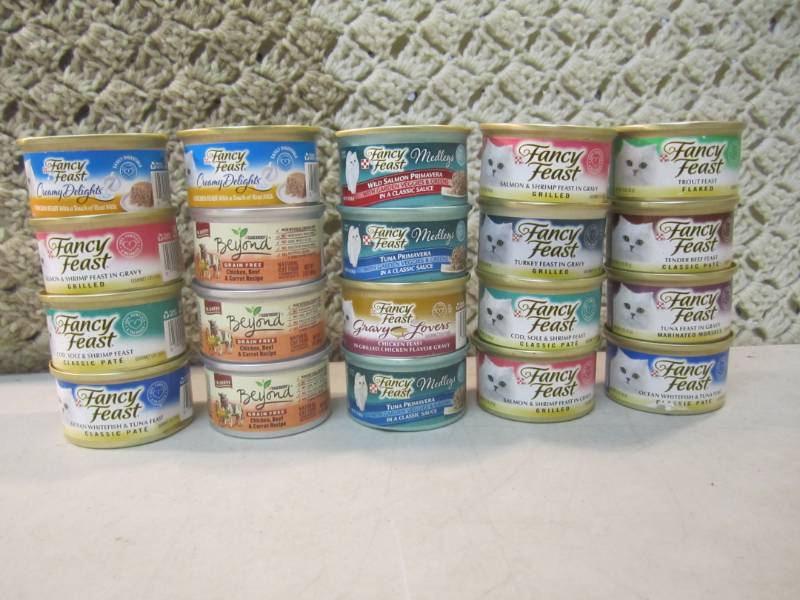 lot 111 image: 20 Cans of Cat Food Looks to be all...